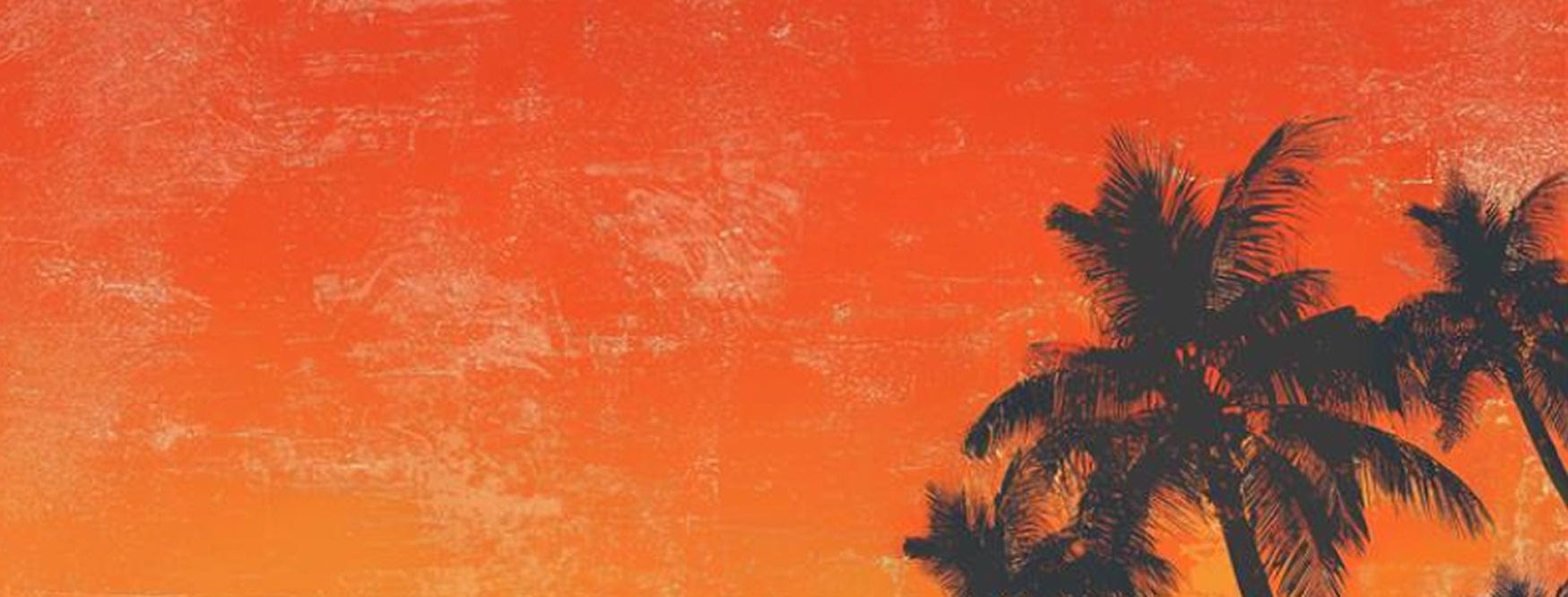 Silhouettes of palm trees against an orange and red gradient background